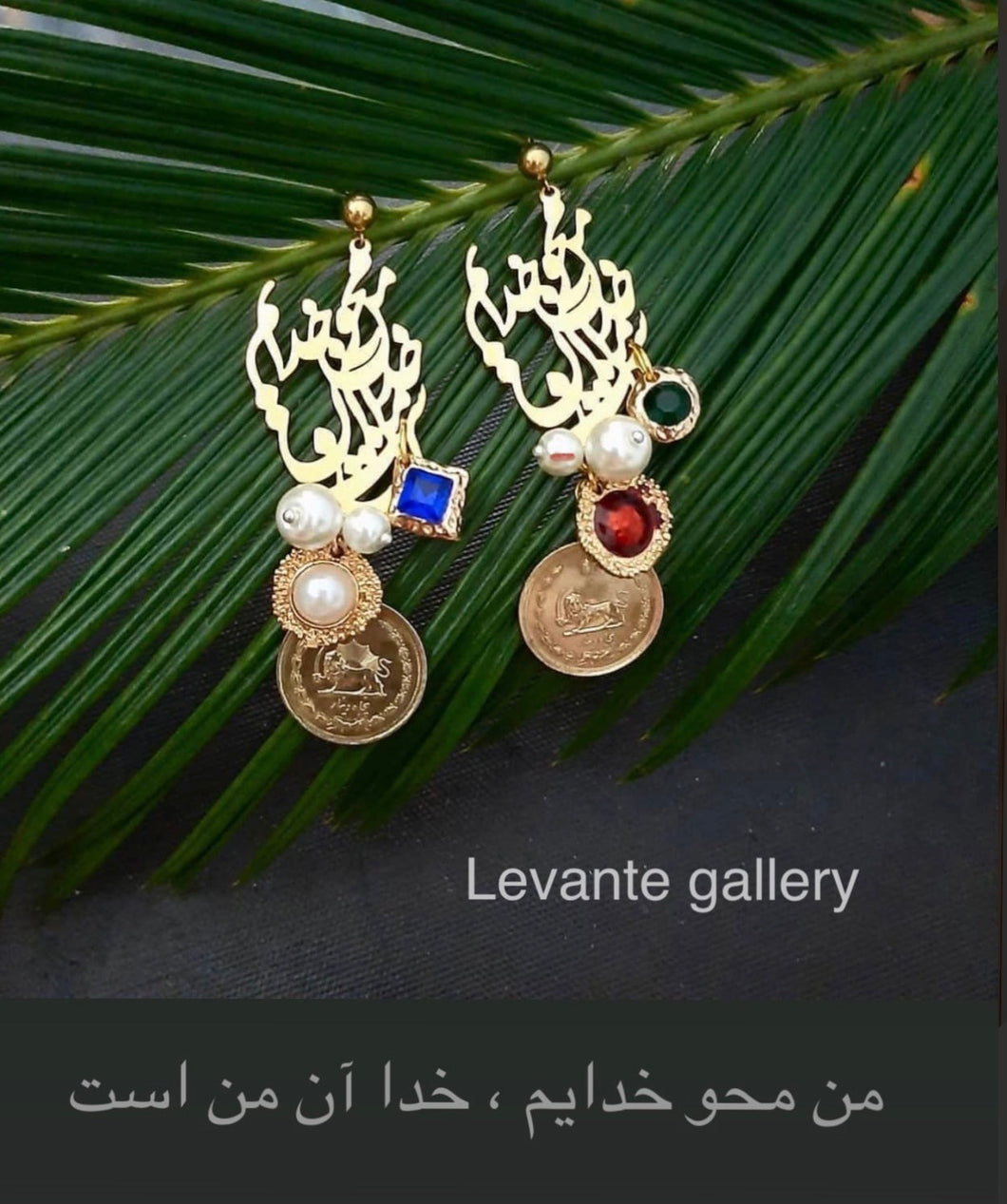 Calligraphy earrings with pearls and stone